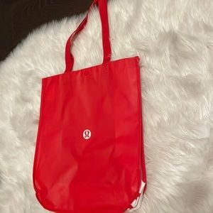 Big red Lululemon reusable bag